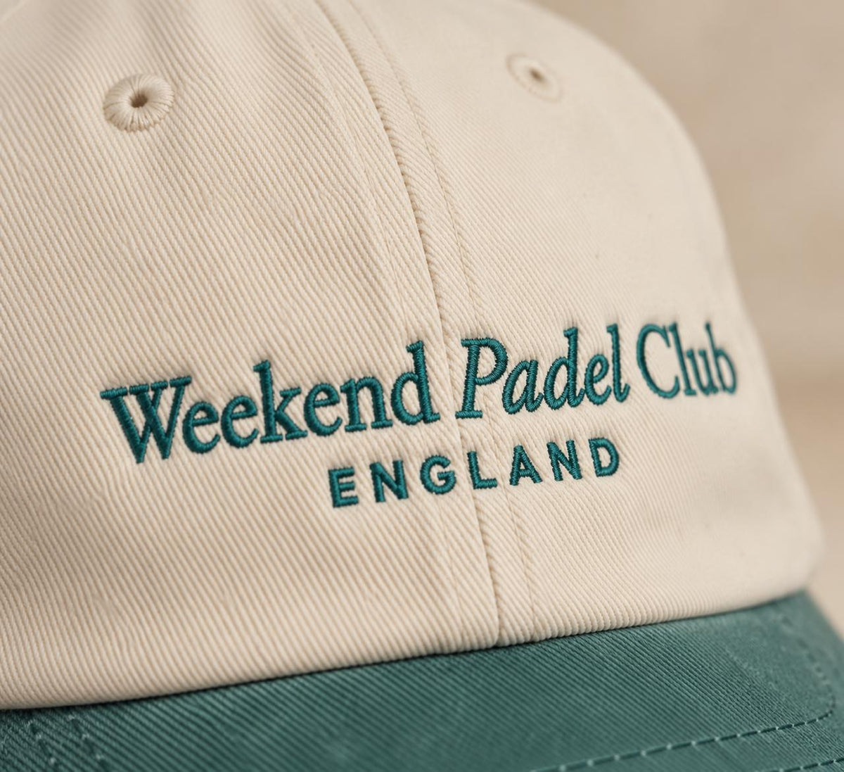 Close-up of the embroidered Weekend Padel Club ENGLAND logo